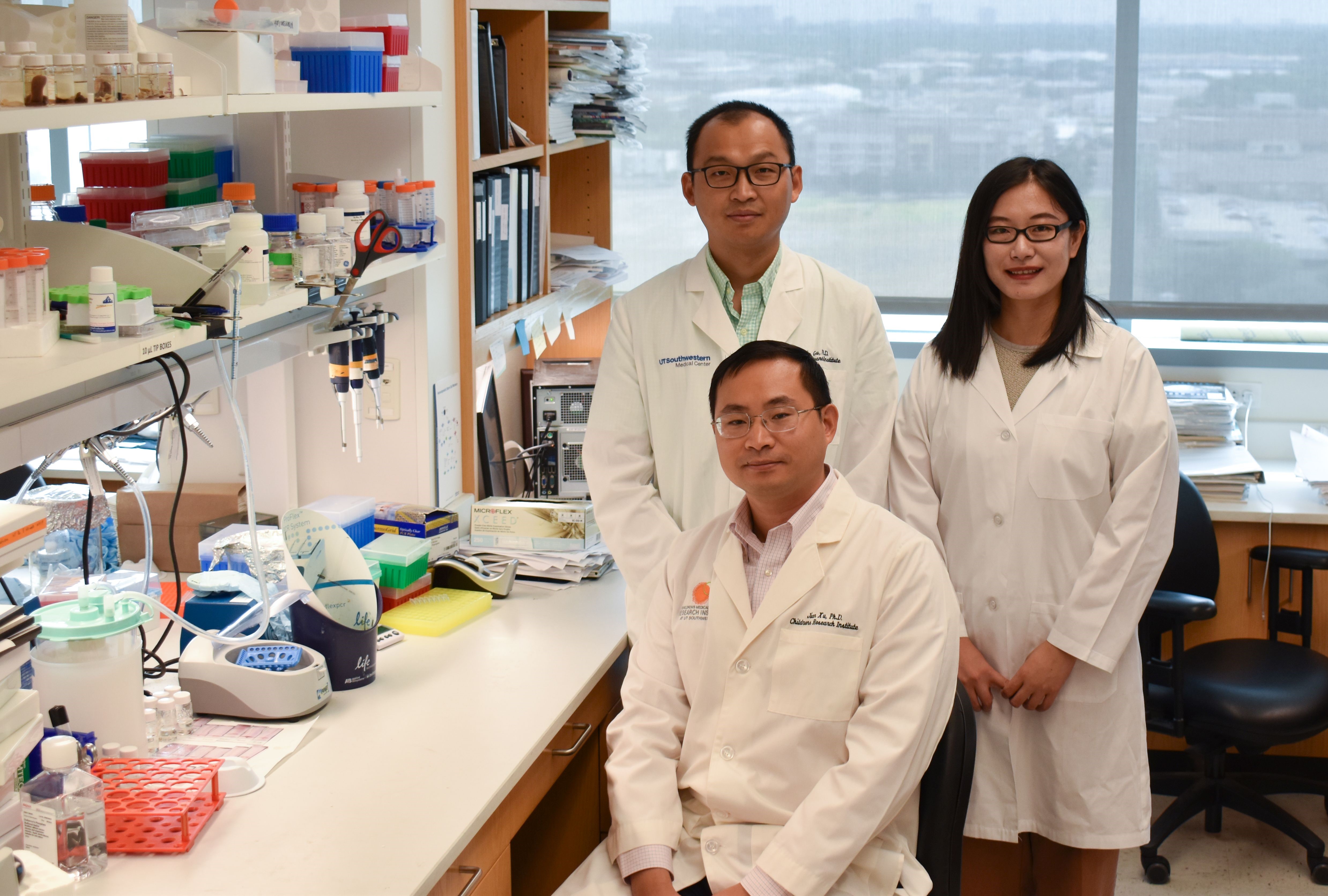 Head of laboratory Jian Xu, PhD with first authors Zhimin Gu, PhD and Yuxuan Liu, PhD.