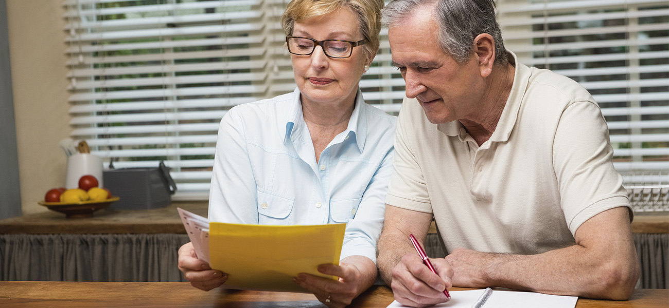 image of a couple organizing medical records